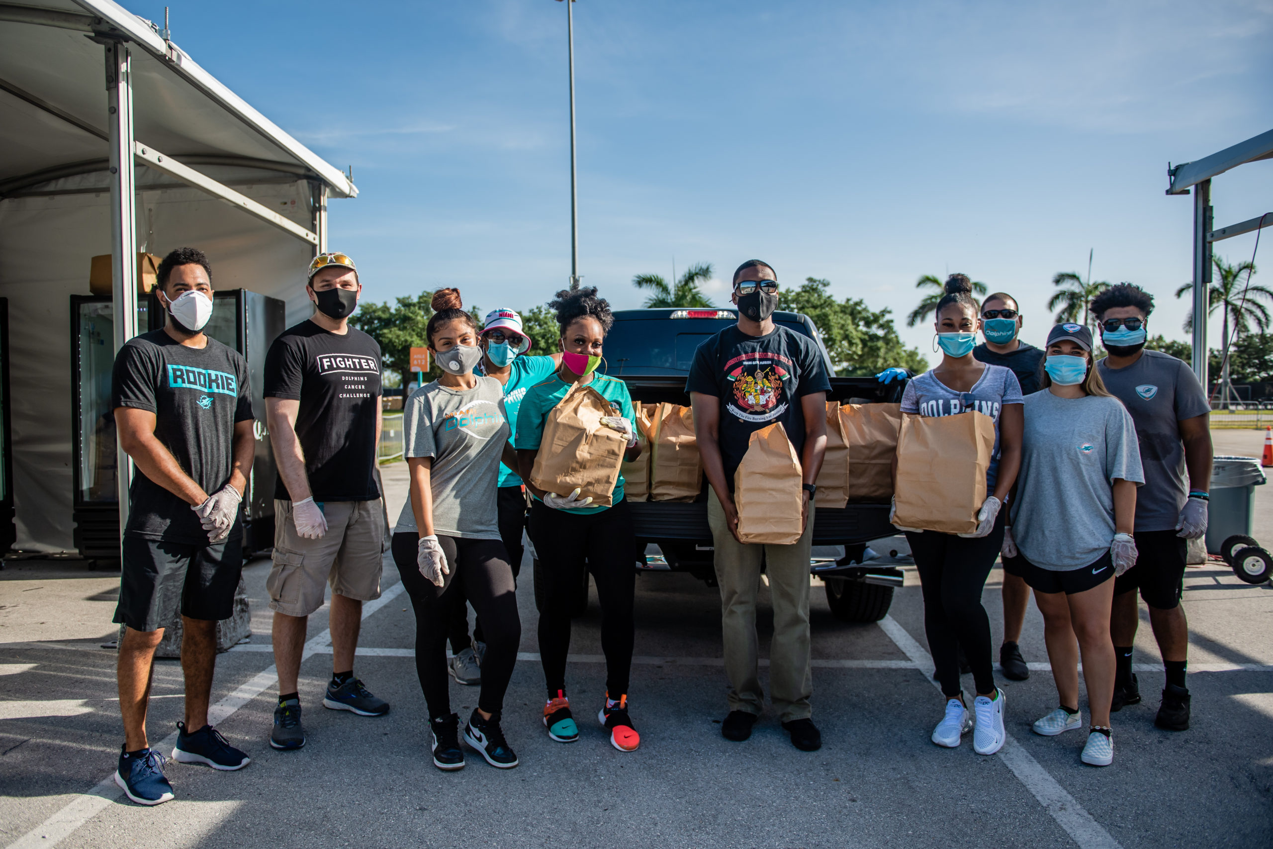 Miami Dolphins, AARP Foundation Host Fifth Annual Million Meal Pack on  NSU's Fort Lauderale /Davie Campus